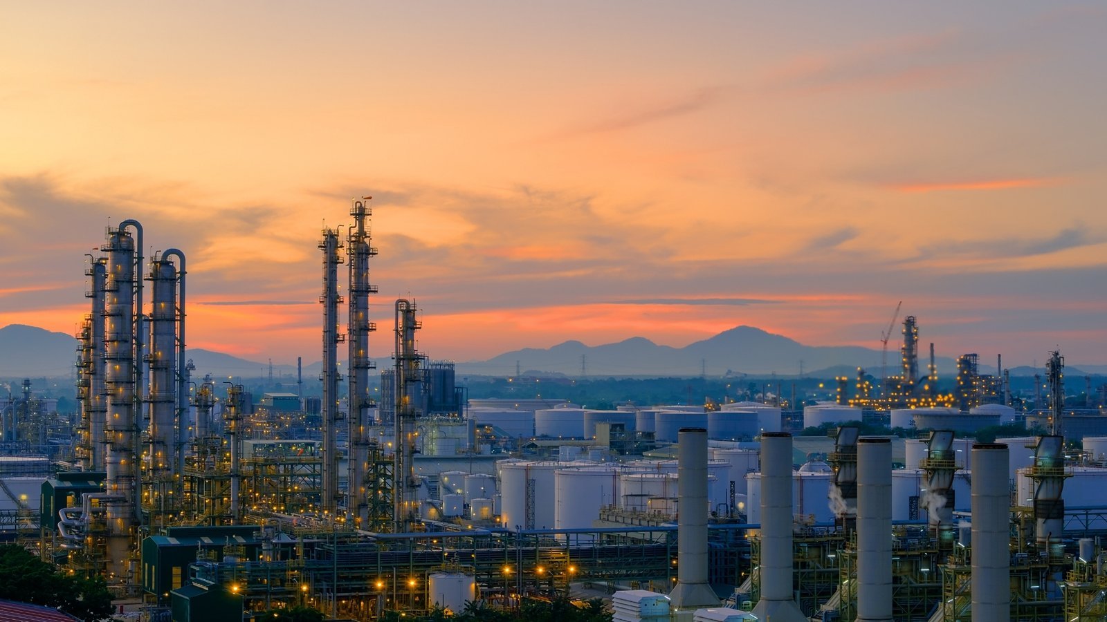 A national oil and gas complex at dawn. In Libya the institutions that control the revenue matter as much as the barrels.