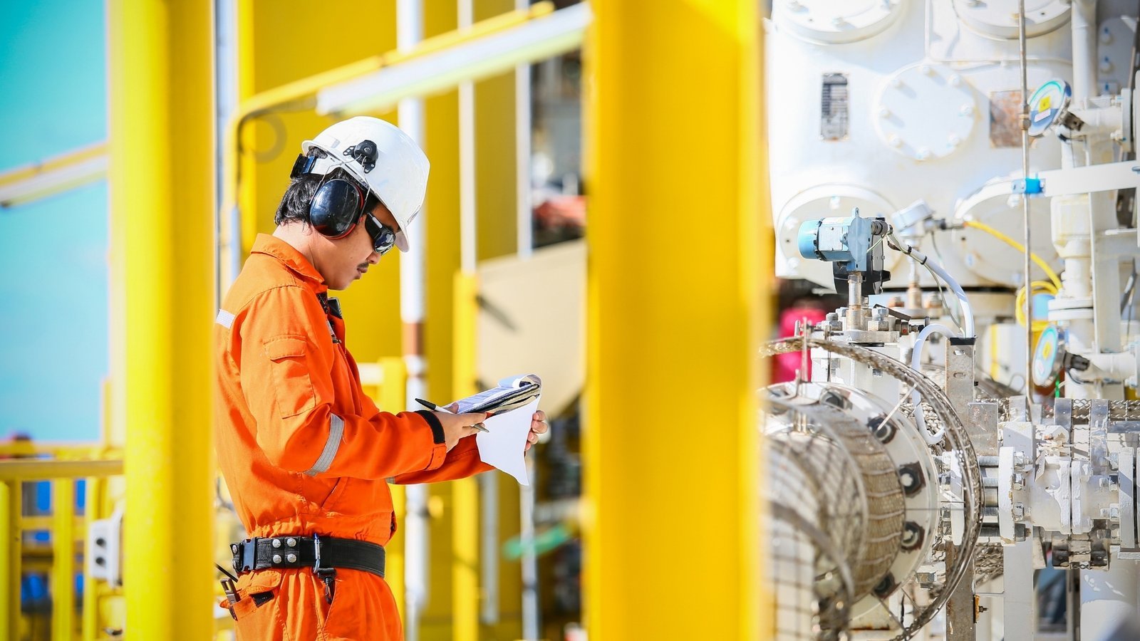 An engineer checking readings against process equipment. Agency selection in energy has the same failure mode as vendor selection: the claim is easy to make, the verification is the work, and almost nobody does it.